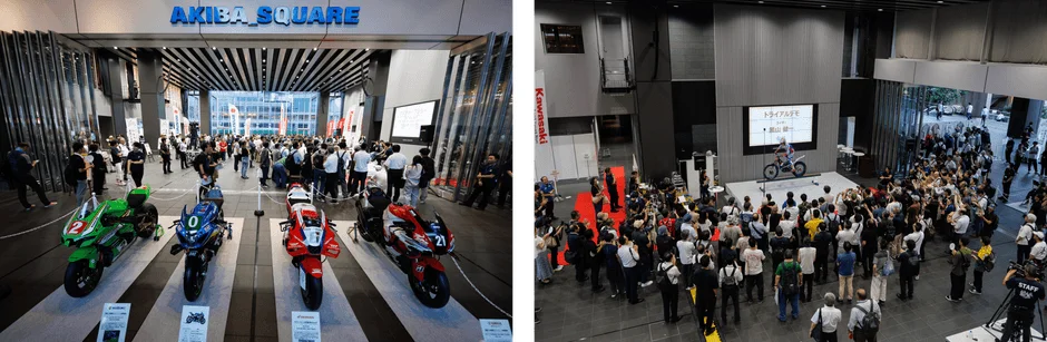 秋葉原スクエアで開催されたバイクイベントの様子。展示されたレーシングバイクを多くの人が見学し、別会場ではトライアルバイクのデモンストレーションが行われ、観客がライダーの妙技に熱狂している。