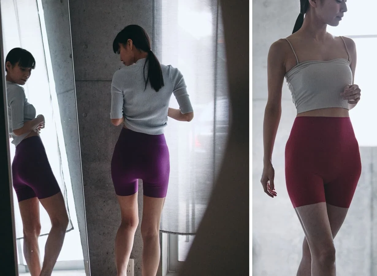 女性が鏡の前でショートパンツを試着