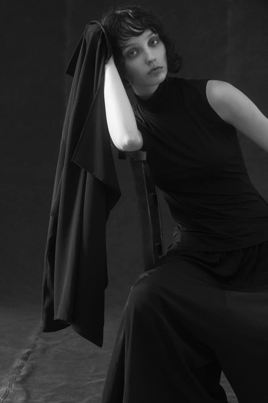 Monochrome portrait of a woman sitting