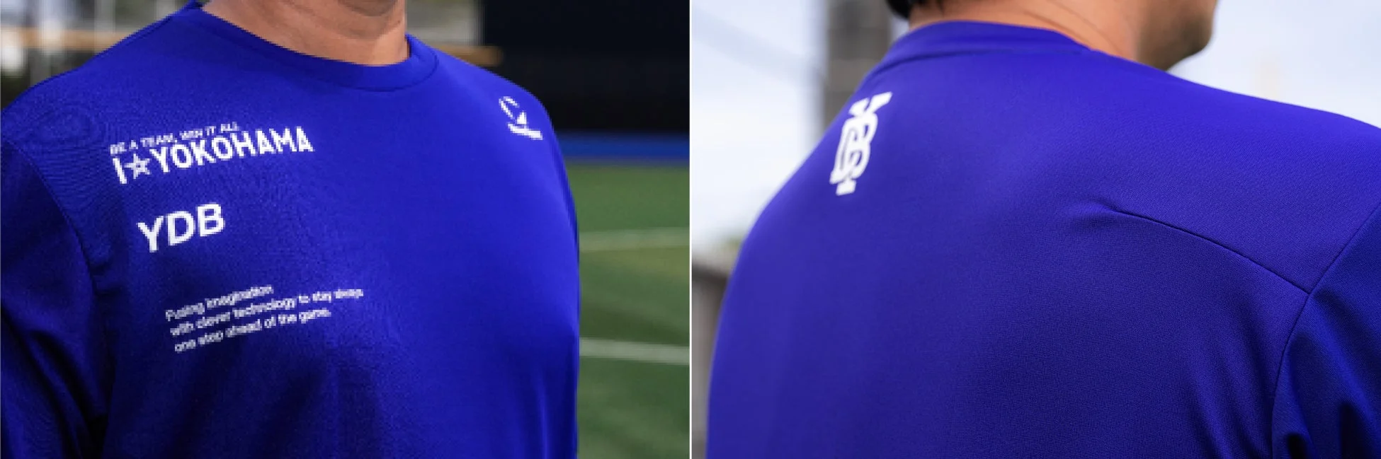 青い長袖シャツを着た人物のクローズアップ画像です。シャツには「I☆YOKOHAMA」「YDB」といった文字と、「BE A TEAM, WIN IT ALL」などのスローガンが白字でプリントされています。