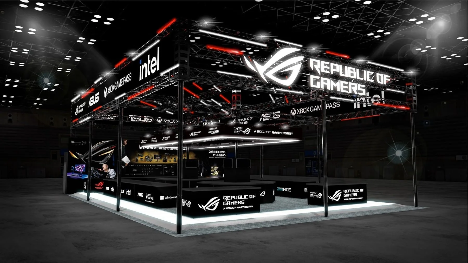 ゲーミングブランド「Republic of Gamers (ROG)」のイベントブースの画像です。黒を基調としたブースは、ROG、ASUS、Intel、Xbox Game Passのロゴが赤と白のLEDでライトアップされ、ゲーミングPCや関連製品が展示されており、来場者を惹きつけるデザインです。