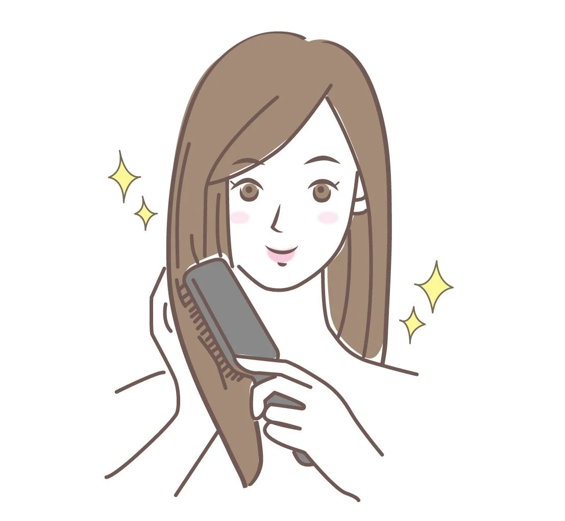 髪をとかす女性のイラスト
